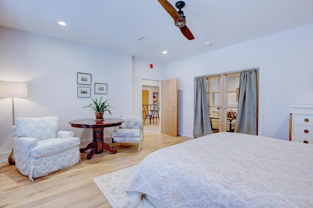 bedroom featuring ceiling fan and light wood-type flooring