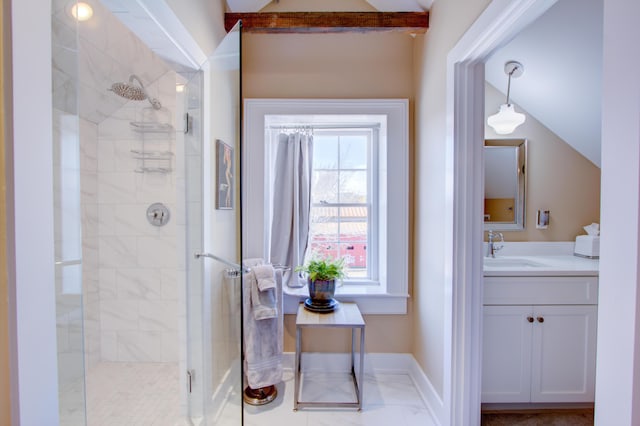 bathroom with vanity and a shower with shower door