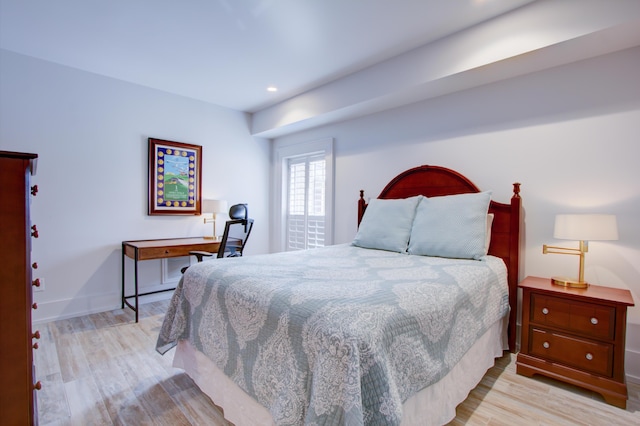 bedroom with light hardwood / wood-style floors