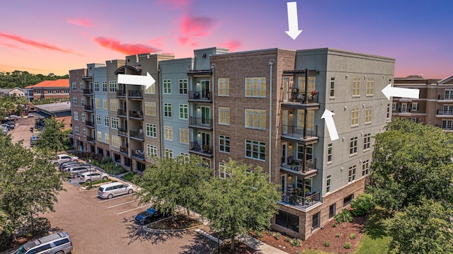 125 Pier View St Unit 408, Charleston, SC 29492 - property at dusk with uncovered parking