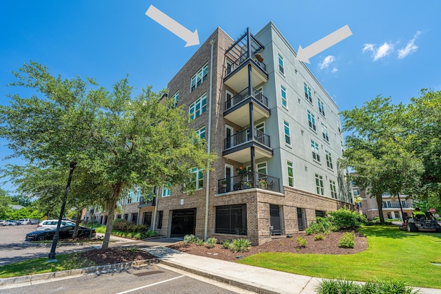 125 Pier View St Unit 408, Charleston, SC 29492 - view of property with uncovered parking