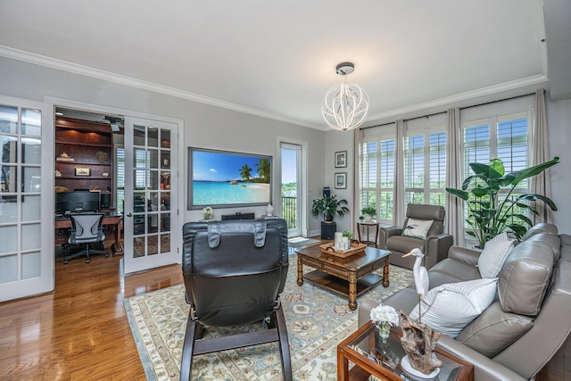 125 Pier View St Unit 408, Charleston, SC 29492 - living area with a desk, a chandelier, ornamental molding, and wood finished floors