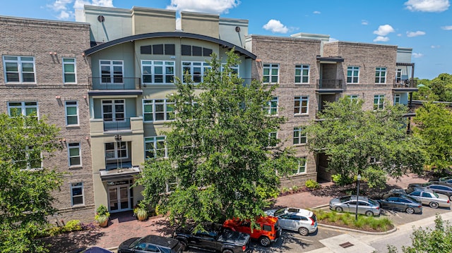125 Pier View St Unit 408, Charleston, SC 29492 - view of building exterior with uncovered parking