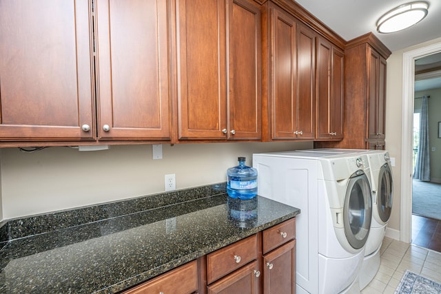 125 Pier View St Unit 408, Charleston, SC 29492 - washroom with cabinet space, washing machine and dryer, and light tile patterned floors