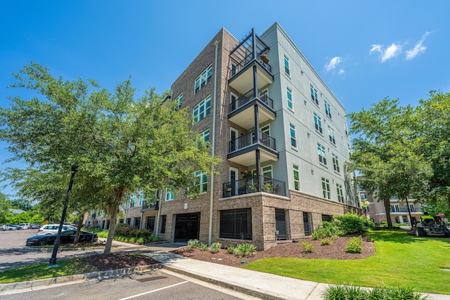 125 Pier View St Unit 408, Charleston, SC 29492 - view of property featuring uncovered parking