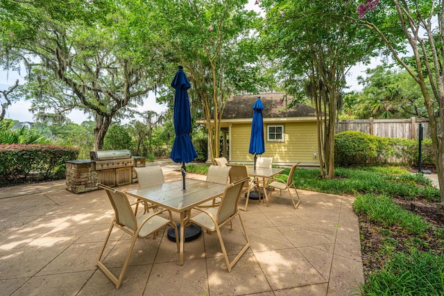 125 Pier View St Unit 408, Charleston, SC 29492 - view of patio / terrace featuring outdoor dining area and exterior kitchen