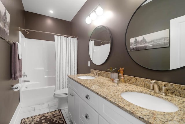 full bathroom with shower / bath combo, vanity, and toilet