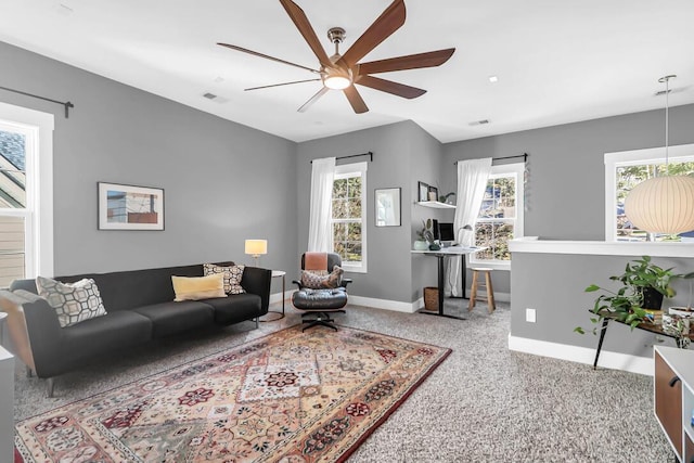 living room featuring ceiling fan