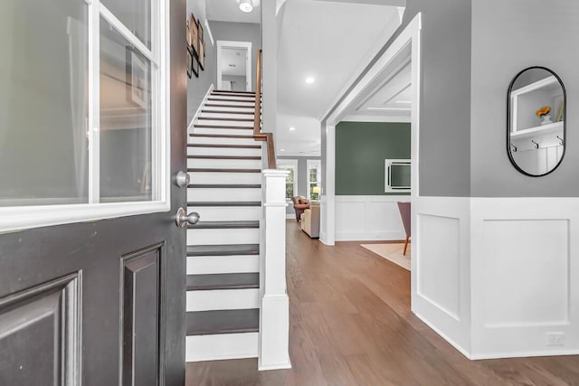 foyer entrance featuring dark wood-type flooring