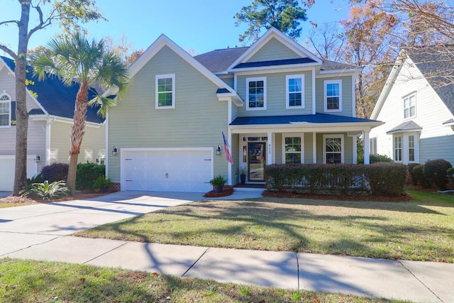 view of front facade with a garage, a porch, and a front lawn