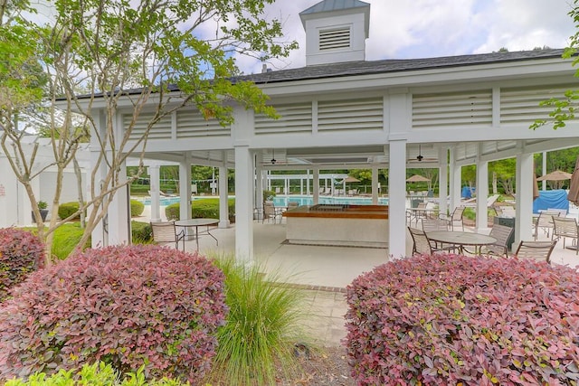 exterior space featuring a pool, a gazebo, and a patio area