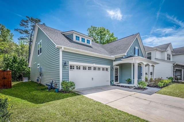 view of front of property with a garage, driveway, a front lawn, and a shingled roof