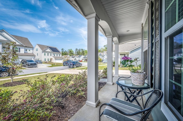 view of patio featuring a residential view and covered porch