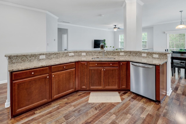 kitchen featuring a sink, visible vents, ornamental molding, dishwasher, and light wood finished floors