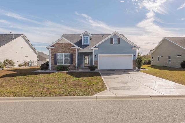 view of front of home with a garage and a front lawn