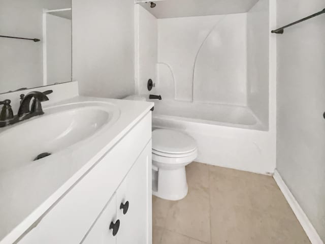 full bathroom featuring tile patterned flooring, vanity, washtub / shower combination, and toilet