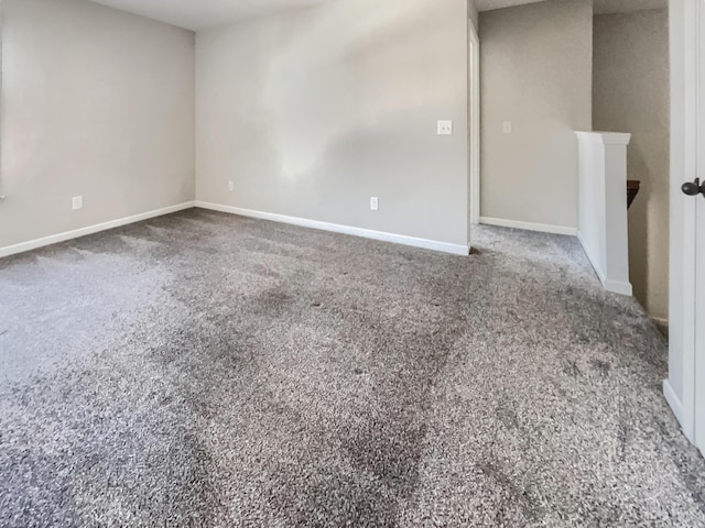 empty room featuring carpet flooring