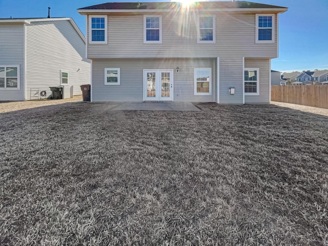 rear view of property featuring a patio