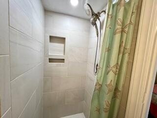 bathroom with a shower with shower curtain