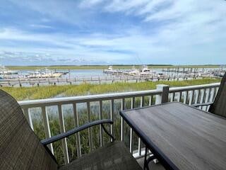 deck featuring a water view