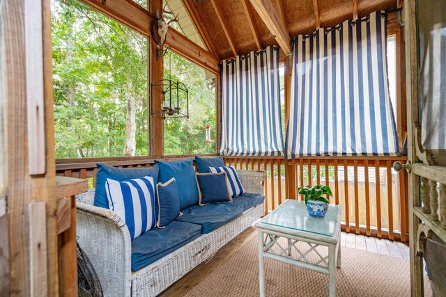 sunroom with lofted ceiling