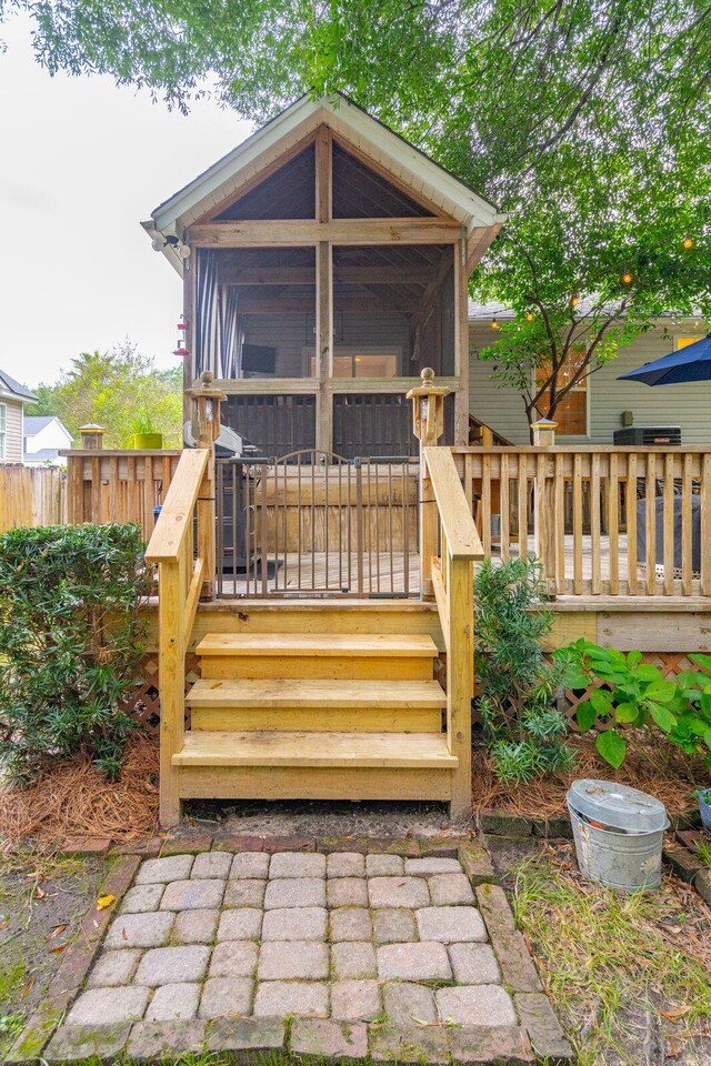 exterior space with a sunroom