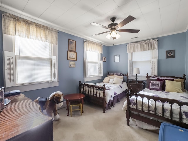 1104 2nd Ave, Kingstree, SC 29556 - bedroom featuring crown molding, carpet, multiple windows, and ceiling fan