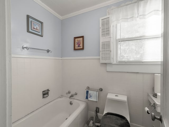 bathroom featuring tile walls, a washtub, crown molding, and toilet