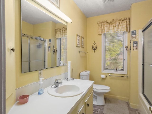 1104 2nd Ave, Kingstree, SC 29556 - bathroom with a shower with door, vanity, toilet, and baseboards
