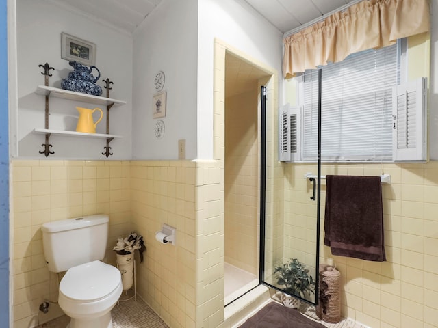 bathroom with walk in shower, tile walls, toilet, and tile patterned floors