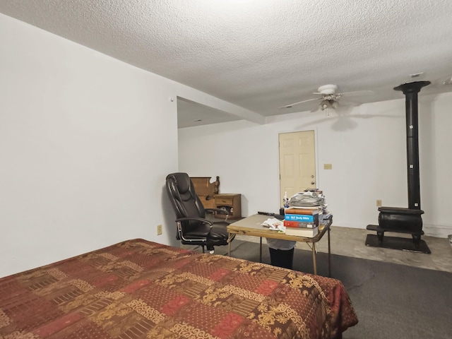 1104 2nd Ave, Kingstree, SC 29556 - carpeted bedroom with a textured ceiling and a ceiling fan