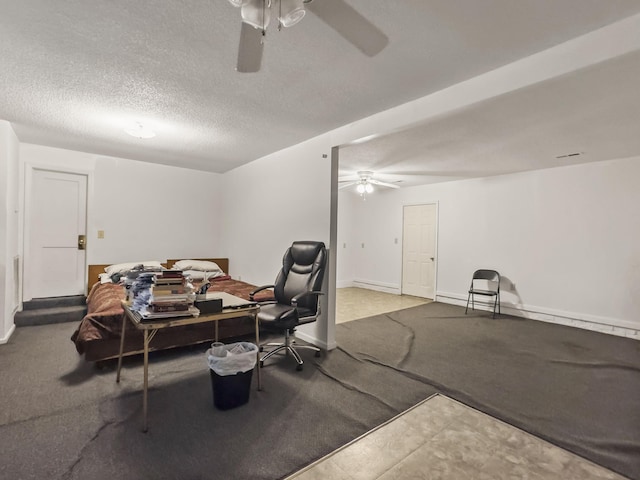 1104 2nd Ave, Kingstree, SC 29556 - dining space featuring ceiling fan, a textured ceiling, carpet, and baseboards