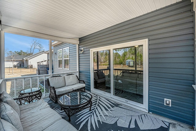 wooden deck with an outdoor hangout area