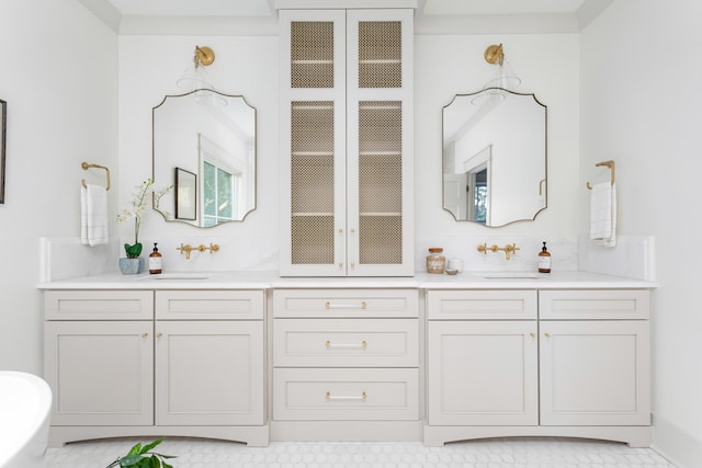 bathroom with vanity and backsplash