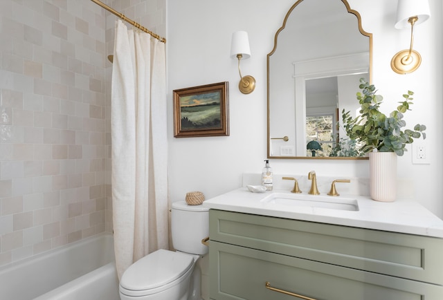 full bathroom with vanity, shower / tub combo, and toilet