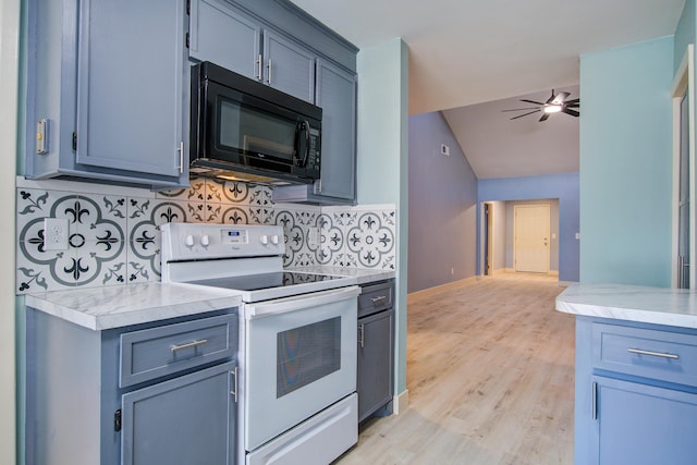 kitchen featuring electric stove, ceiling fan, tasteful backsplash, vaulted ceiling, and light wood-type flooring