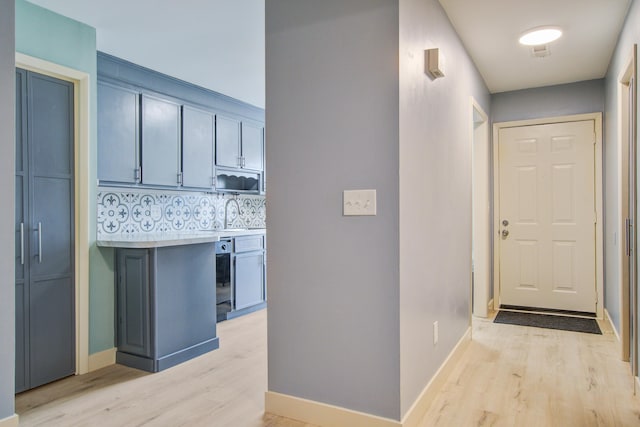 hallway featuring light hardwood / wood-style floors