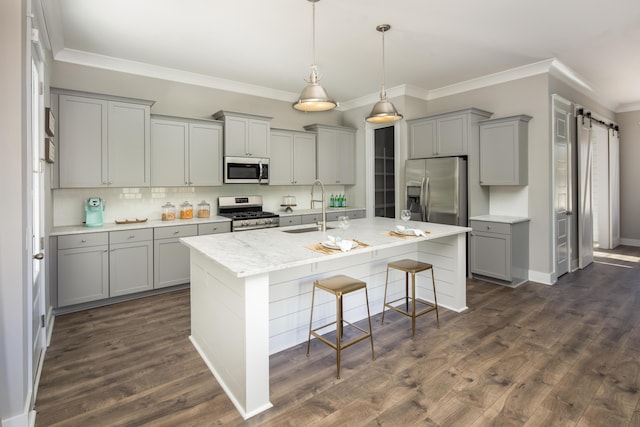 798 Clay Field Trl, Summerville, SC 29485 - kitchen with gray cabinetry, dark wood-type flooring, a barn door, appliances with stainless steel finishes, and a sink