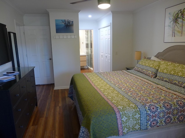 bedroom featuring ceiling fan, dark hardwood / wood-style floors, ensuite bath, a closet, and ornamental molding