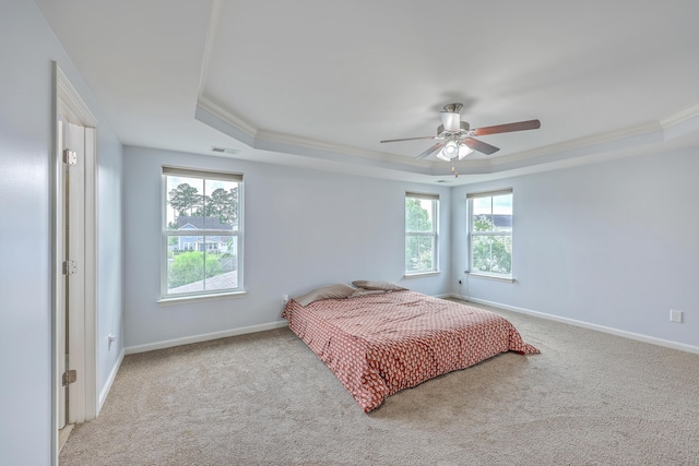 531 Crossland Dr, Moncks Corner, SC 29461 - carpeted bedroom with a raised ceiling, ornamental molding, baseboards, and ceiling fan
