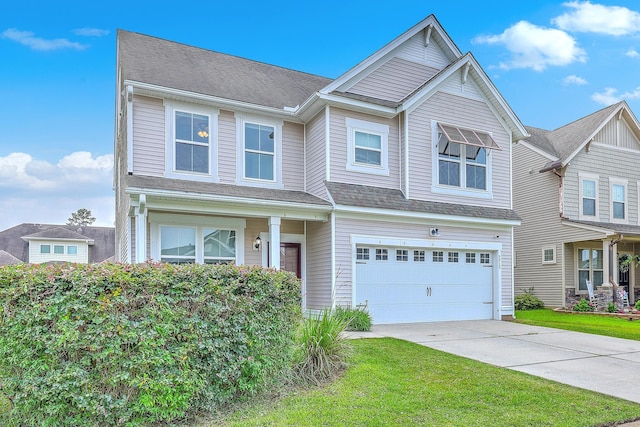 531 Crossland Dr, Moncks Corner, SC 29461 - townhome / multi-family property featuring concrete driveway, an attached garage, a front lawn, and roof with shingles