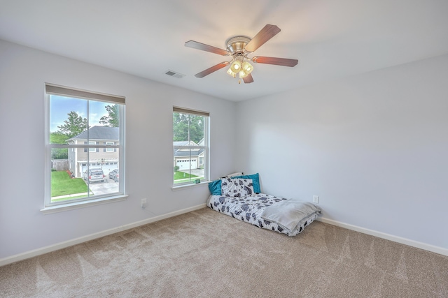 531 Crossland Dr, Moncks Corner, SC 29461 - unfurnished bedroom with carpet floors, baseboards, and a ceiling fan