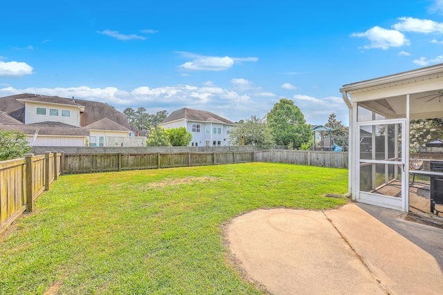 531 Crossland Dr, Moncks Corner, SC 29461 - view of yard featuring a sunroom, a patio, and a residential view
