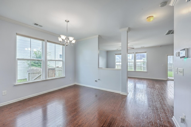 531 Crossland Dr, Moncks Corner, SC 29461 - empty room with dark wood-style flooring, ceiling fan, a smoke detector, crown molding, and a chandelier