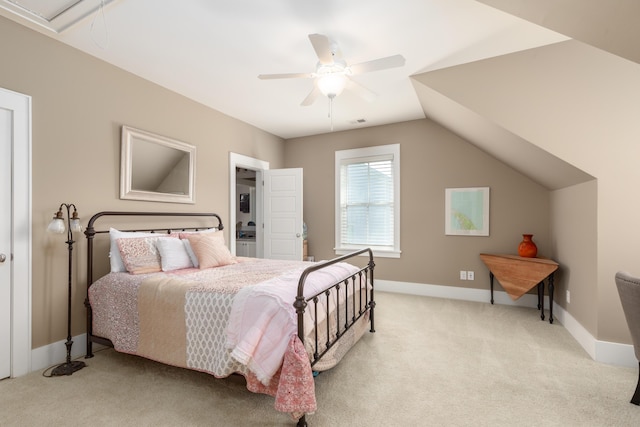 carpeted bedroom with lofted ceiling and ceiling fan