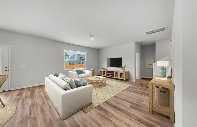 living room with wood-type flooring