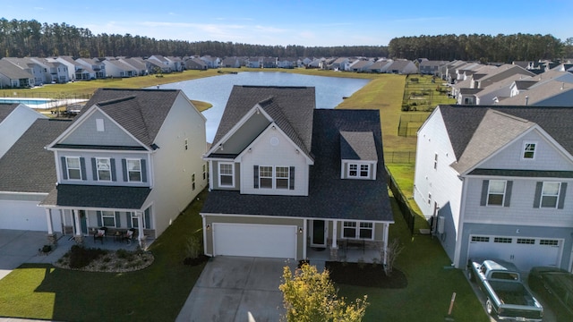 drone / aerial view featuring a water view