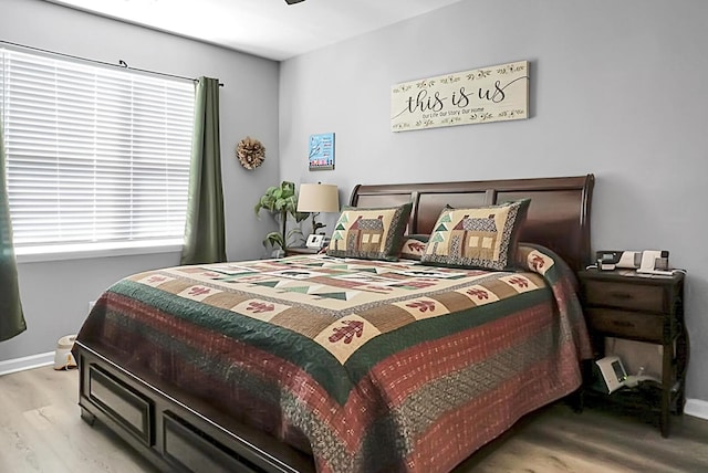 bedroom featuring light hardwood / wood-style floors