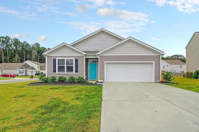 view of front of home featuring a garage and a front lawn