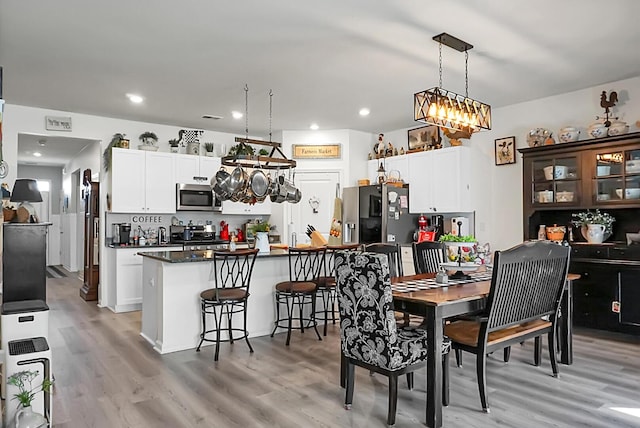 dining area featuring light hardwood / wood-style floors